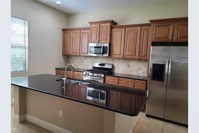 14305 Stirling Drive, Lakewood Ranch, FL 34202 - Photo 3