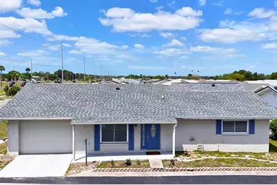 702 Huxley Place, Sun City Center, FL 33573 - Photo 1