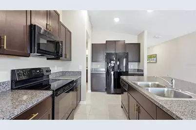 15455 Broad Brush Drive, Sun City Center, FL 33573 - Photo 11