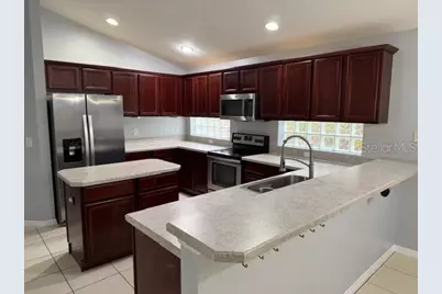 725 Bridgeway Boulevard, Orlando, FL 32828 - Photo 11