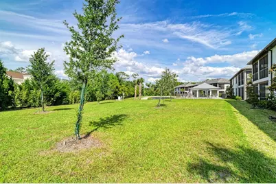 5687 N Honore Avenue #411, Sarasota, FL 34243 - Photo 25