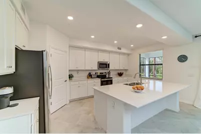 5687 N Honore Avenue #411, Sarasota, FL 34243 - Photo 9