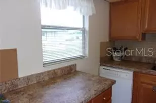 1811 Bedford Ln, Sun City Center, FL 33573 - Photo 9