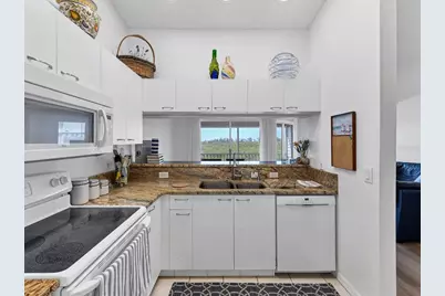 3607 E Bay Drive #206, Holmes Beach, FL 34217 - Photo 11