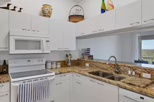 3607 E Bay Dr, Holmes Beach, FL 34217 - Photo 11