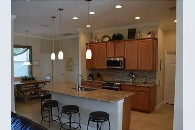 7779 Arolla Pine Boulevard, Sarasota, FL 34240 - Photo 25