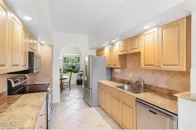5590 Golf Pointe Drive #5590, Sarasota, FL 34243 - Photo 13