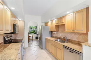 5590 Golf Pointe Dr, Sarasota, FL 34243 - Photo 13