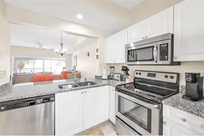1044 Woodshire Lane #B211, Naples, FL 34105 - Photo 13