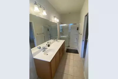 3870 82nd Avenue Cir E #104, Sarasota, FL 34243 - Photo 13