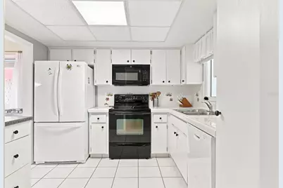 2407 Riverbluff Parkway #V-226, Sarasota, FL 34231 - Photo 7