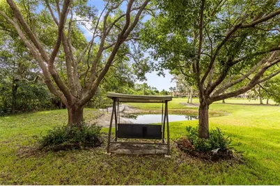 9338 Whispering Meadow Court, New Port Richey, FL 34655 - Photo 13