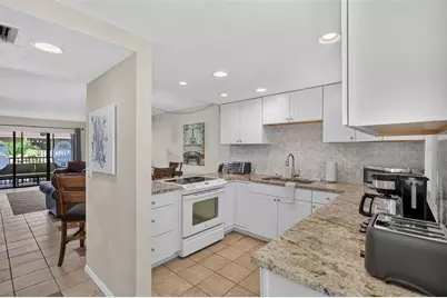 6157 Midnight Pass Road #E53, Sarasota, FL 34242 - Photo 5