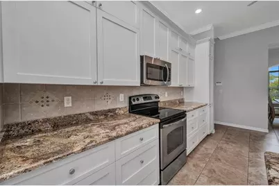 12951 SW Kingsway Circle, Lake Suzy, FL 34269 - Photo 7