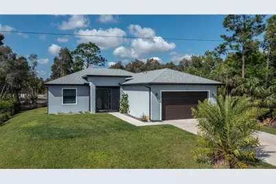 816 Bell Boulevard S, Lehigh Acres, FL 33974 - Photo 1