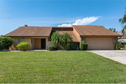 12313 SW Kingsway Circle, Lake Suzy, FL 34269 - Photo 1