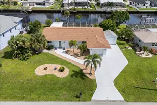 124 Sinclair St SE, Port Charlotte, FL 33952 - Photo 1