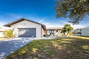 128 Sinclair St SE, Port Charlotte, FL 33952 - Photo 1