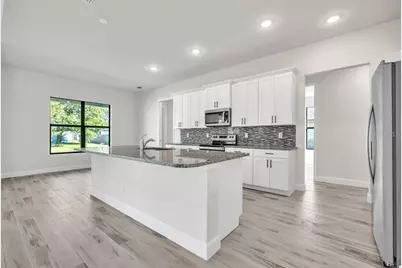 459 NE 2nd Place, Cape Coral, FL 33909 - Photo 11