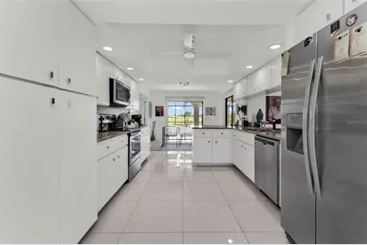 11903 SW Kingsway Circle, Lake Suzy, FL 34269 - Photo 11