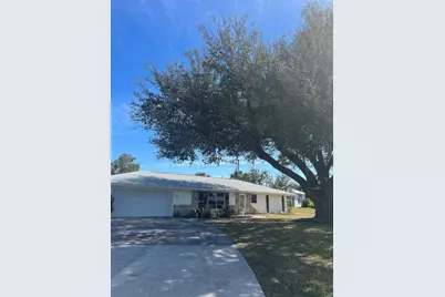 355 Spring Lake Boulevard NW, Port Charlotte, FL 33952 - Photo 1