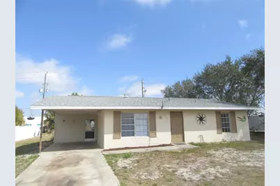 440 N Spring Lake Boulevard NW, Port Charlotte, FL 33952 - Photo 1