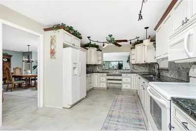 11409 SW Courtney Drive, Lake Suzy, FL 34269 - Photo 9