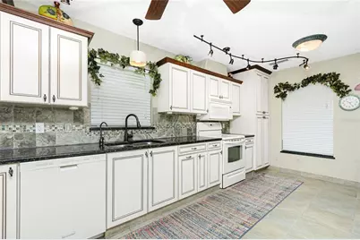 11409 SW Courtney Drive, Lake Suzy, FL 34269 - Photo 11