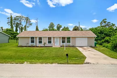 1057 Tropical Avenue NW, Port Charlotte, FL 33948 - Photo 1