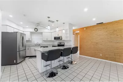 4 E Greens Circle #4E, Lehigh Acres, FL 33936 - Photo 3