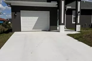 721 Ivan Ave S, Lehigh Acres, FL 33973 - Photo 1
