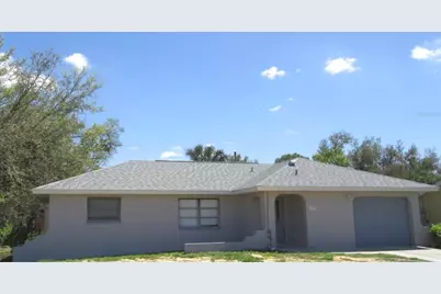 1074 Birchcrest Boulevard, Port Charlotte, FL 33952 - Photo 1