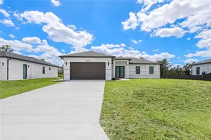 1122 S Edelweiss Street E, Lehigh Acres, FL 33974 - Photo 1