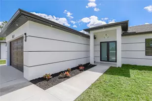 1122 S Edelweiss Street E, Lehigh Acres, FL 33974 - Photo 3