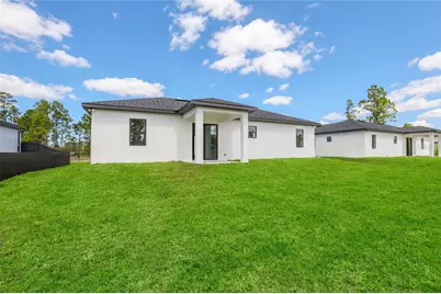 1122 S Edelweiss Street E, Lehigh Acres, FL 33974 - Photo 27