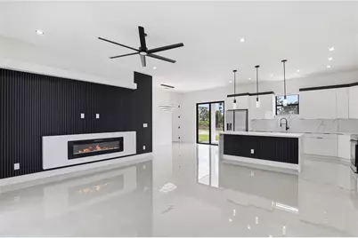 1124 S Edelweiss Street E, Lehigh Acres, FL 33974 - Photo 5