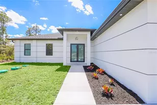 1124 S Edelweiss Street E, Lehigh Acres, FL 33974 - Photo 3