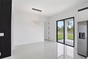 1124 S Edelweiss Street E, Lehigh Acres, FL 33974 - Photo 7