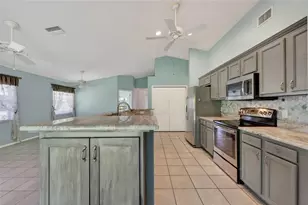 13440 SW Pembroke Cir N, Lake Suzy, FL 34269 - Photo 13