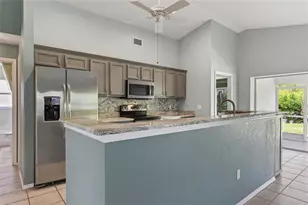 13440 SW Pembroke Cir N, Lake Suzy, FL 34269 - Photo 9