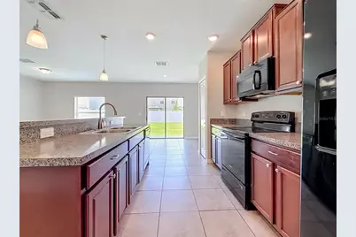 7405 Evening Primrose Court, Tampa, FL 33619 - Photo 19