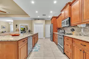 11614 SW Courtly Manor Dr, Lake Suzy, FL 34269 - Photo 9