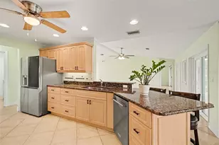 12001 SW Kingsway Cir, Lake Suzy, FL 34269 - Photo 9
