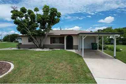 112 Sunnyside Street NW, Port Charlotte, FL 33952 - Photo 1