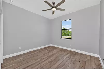 9590 Honeymoon Drive, Port Charlotte, FL 33981 - Photo 33