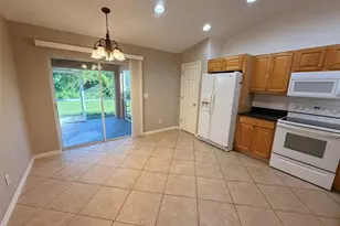 13356 SW Pembroke Cir N, Lake Suzy, FL 34269 - Photo 5