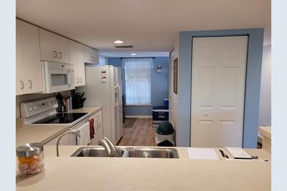 9550 Fiddlers Green Circle #105, Rotonda West, FL 33947 - Photo 7