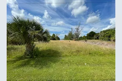 10093 Hallendale Drive, Port Charlotte, FL 33981 - Photo 1