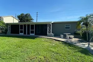 394 N Spring Lake Blvd NW, Port Charlotte, FL 33952 - Photo 1