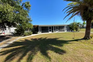 394 N Spring Lake Blvd NW, Port Charlotte, FL 33952 - Photo 1